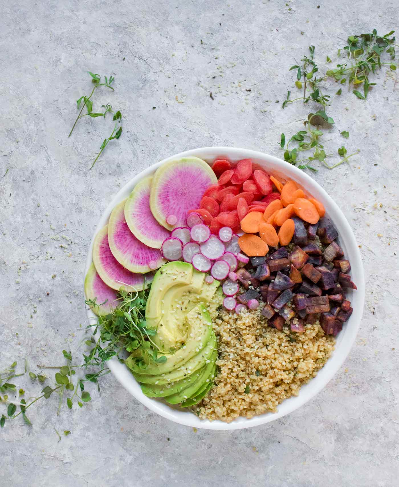 Vegan buddha bowl with herb garnish