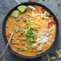 Taco Soup in a black bowl.