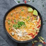Taco soup in a black soup bowl
