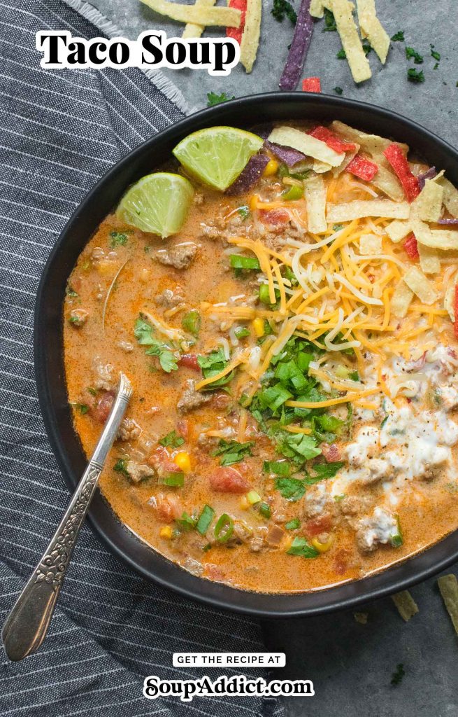 A black soup bowl filled with Taco Soup.