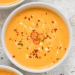 Thai Pumpkin Soup in a white bowl.