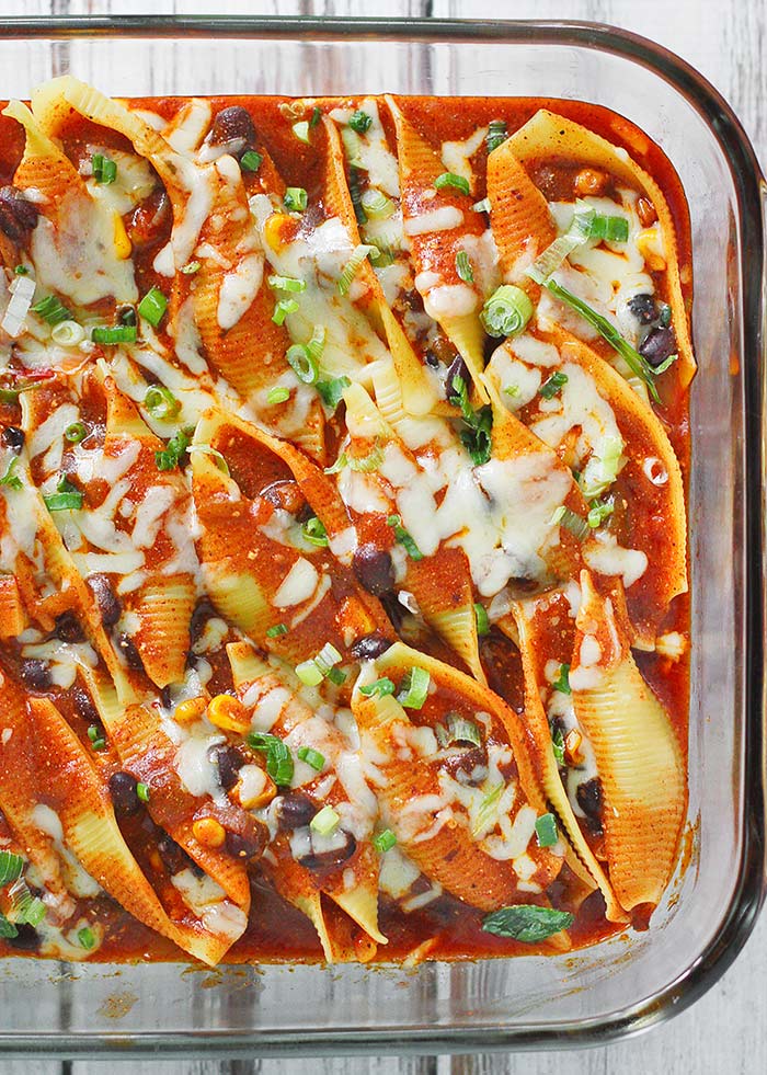 Enchilada stuffed shells in a baking dish