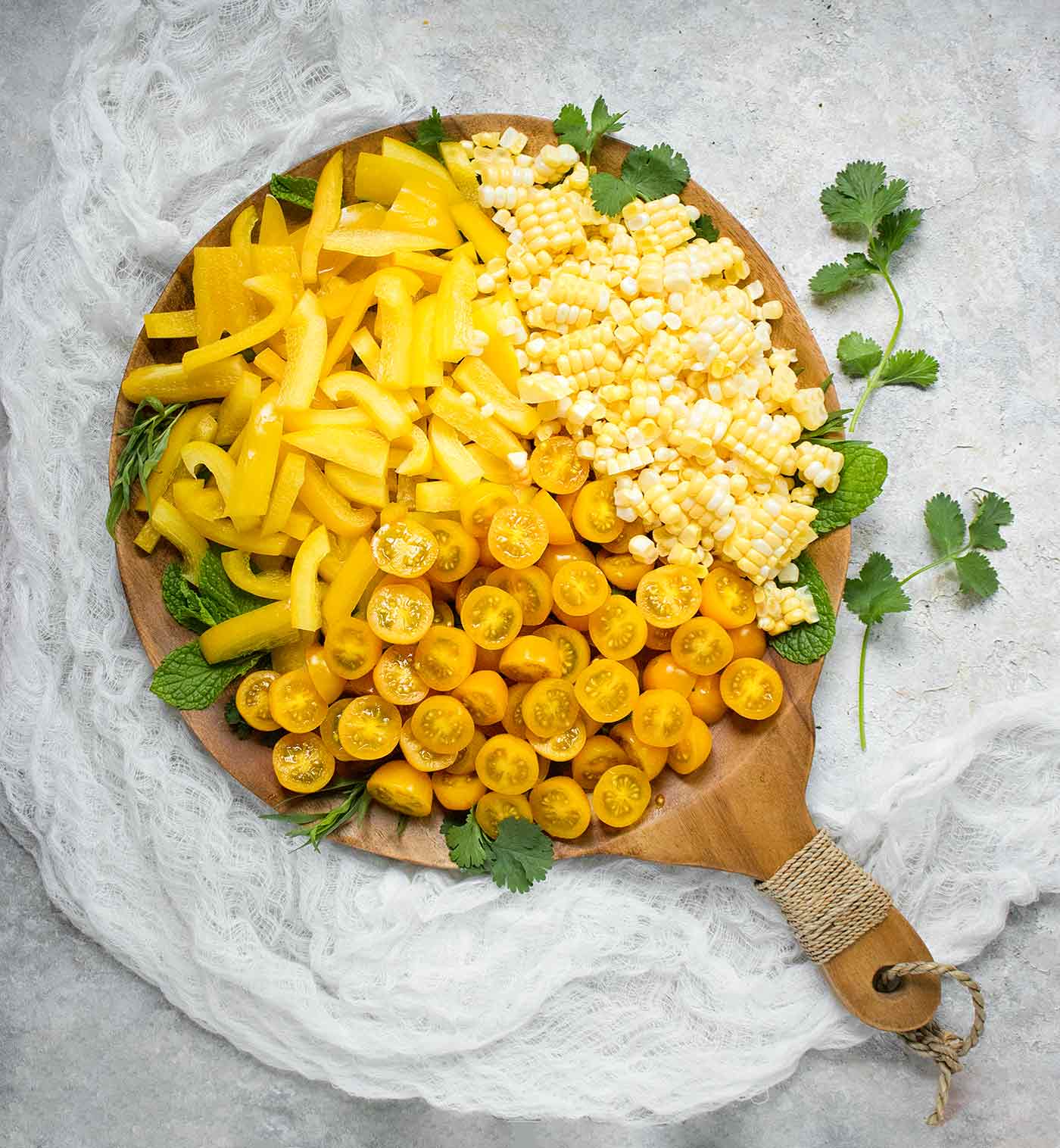 Ingredients for Yellow Gazpacho on a serving board